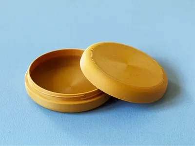 Low profile twist box with rounded top