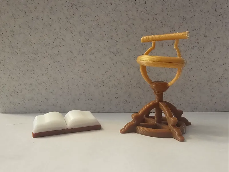 Fawkes Phoenix Stand & Mini Book - Dumbledore Nook