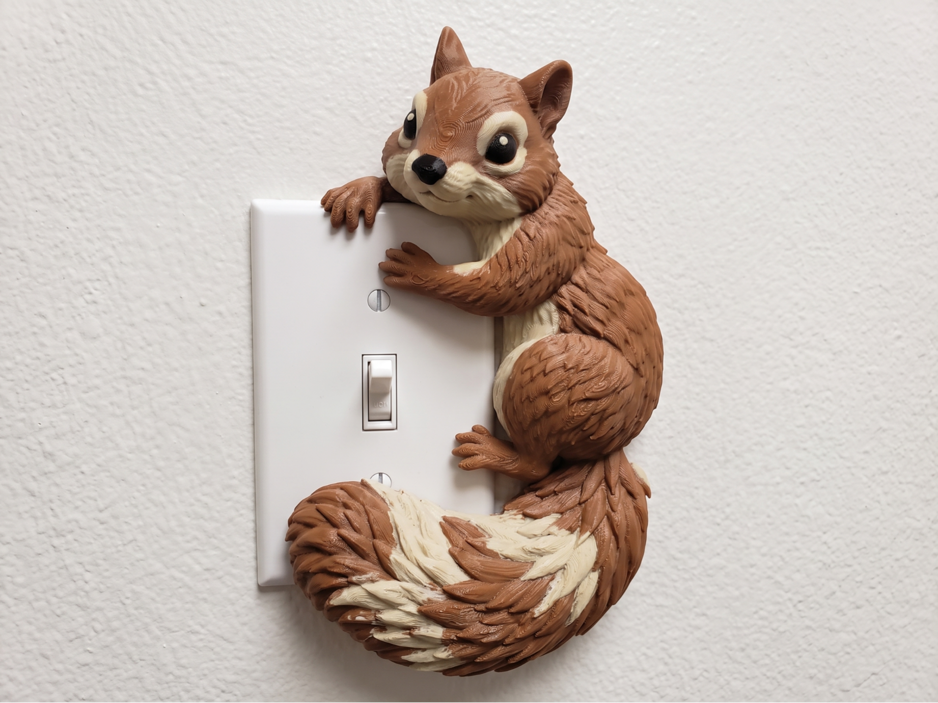 Protector decorativo para interruptor con ardilla