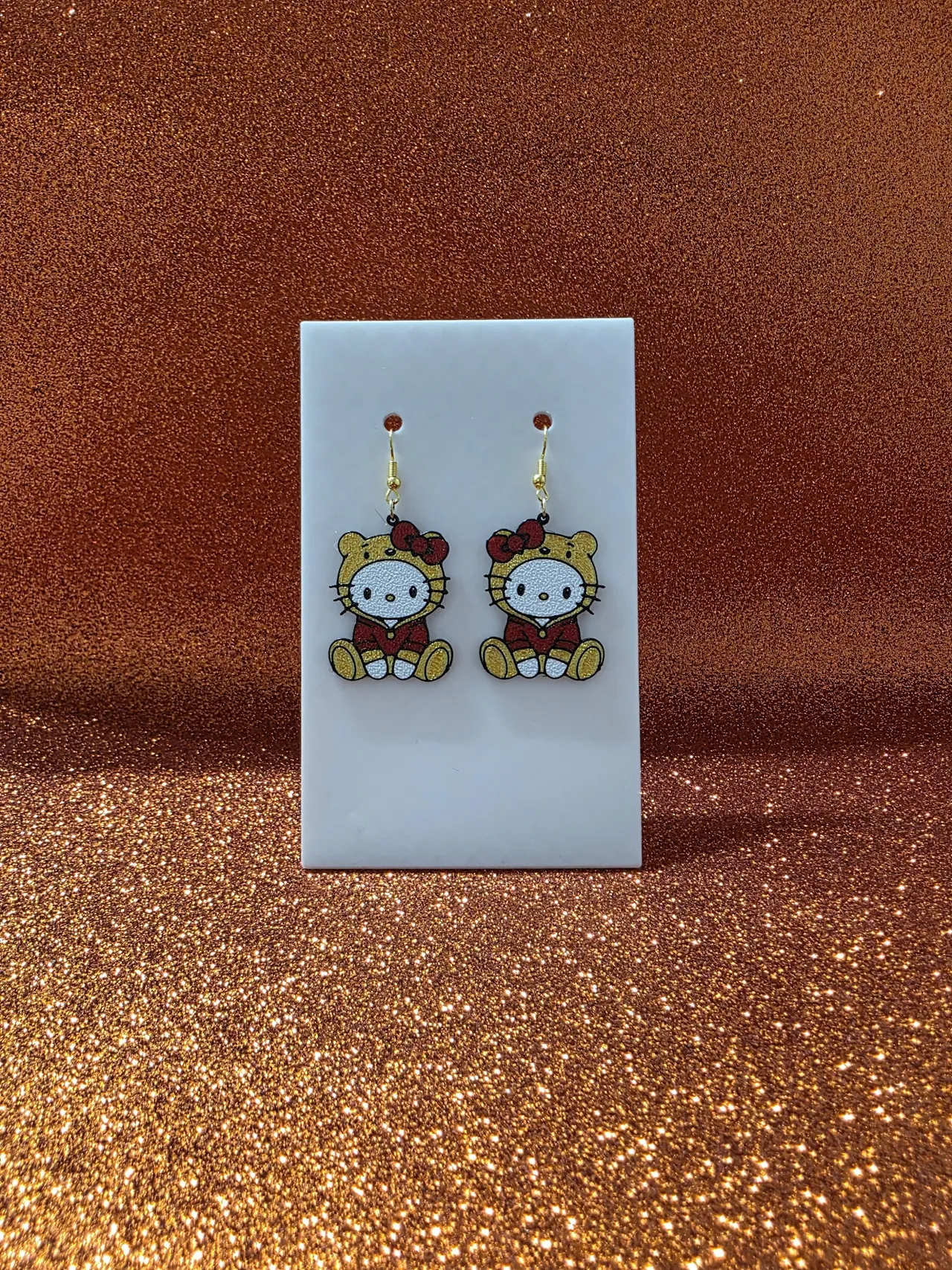 Winnie the Kitty earrings view 2