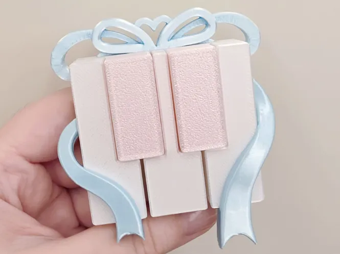 蝴蝶结钢琴按键器