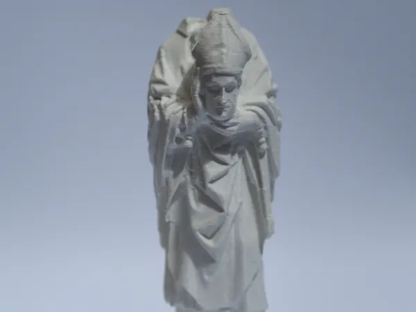 Saint Denis — statuette religieuse