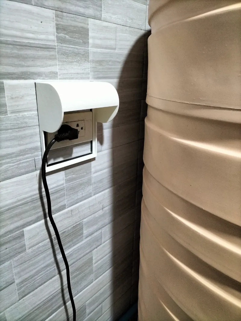 Plug socket rain cover