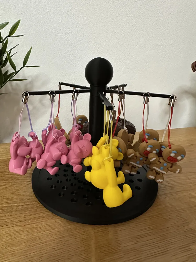 Rotating Stand for keychain and Jewels - Free 3D Print Model - MakerWorld