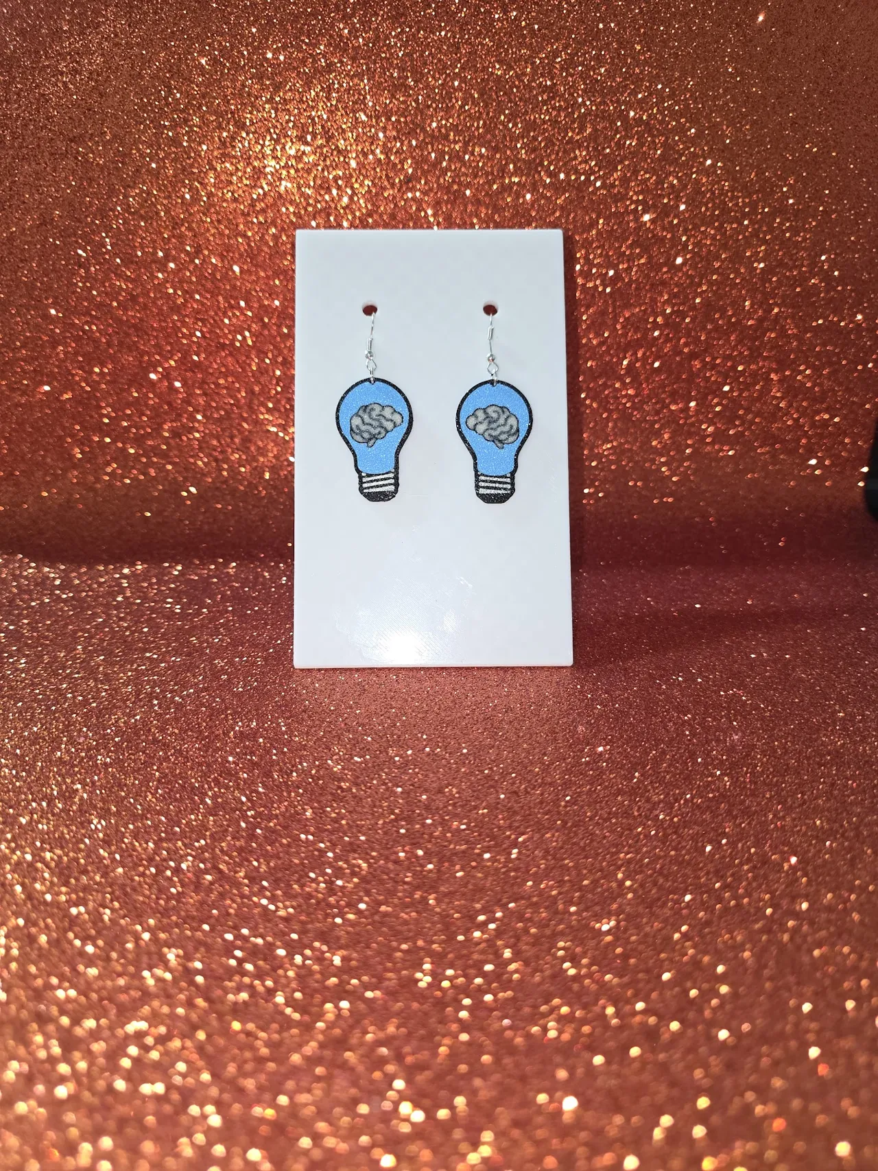 Brain in a bulb earrings view 2