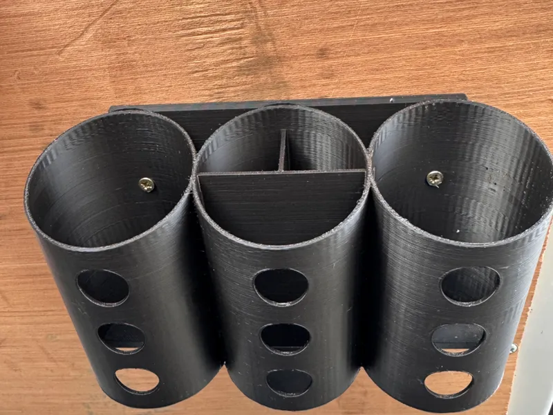 Spray can pen holder