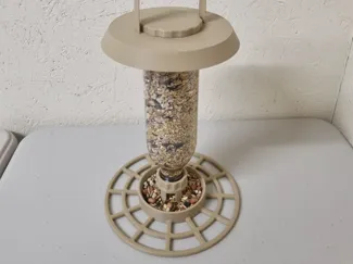 Smoothie bottle bird feeder