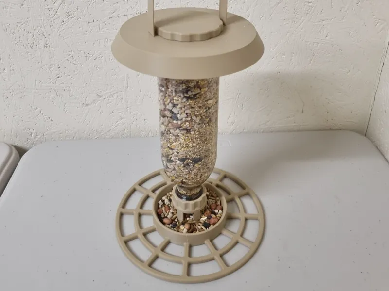 Smoothie bottle bird feeder