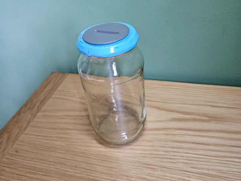 Money box, jam jar insert. 