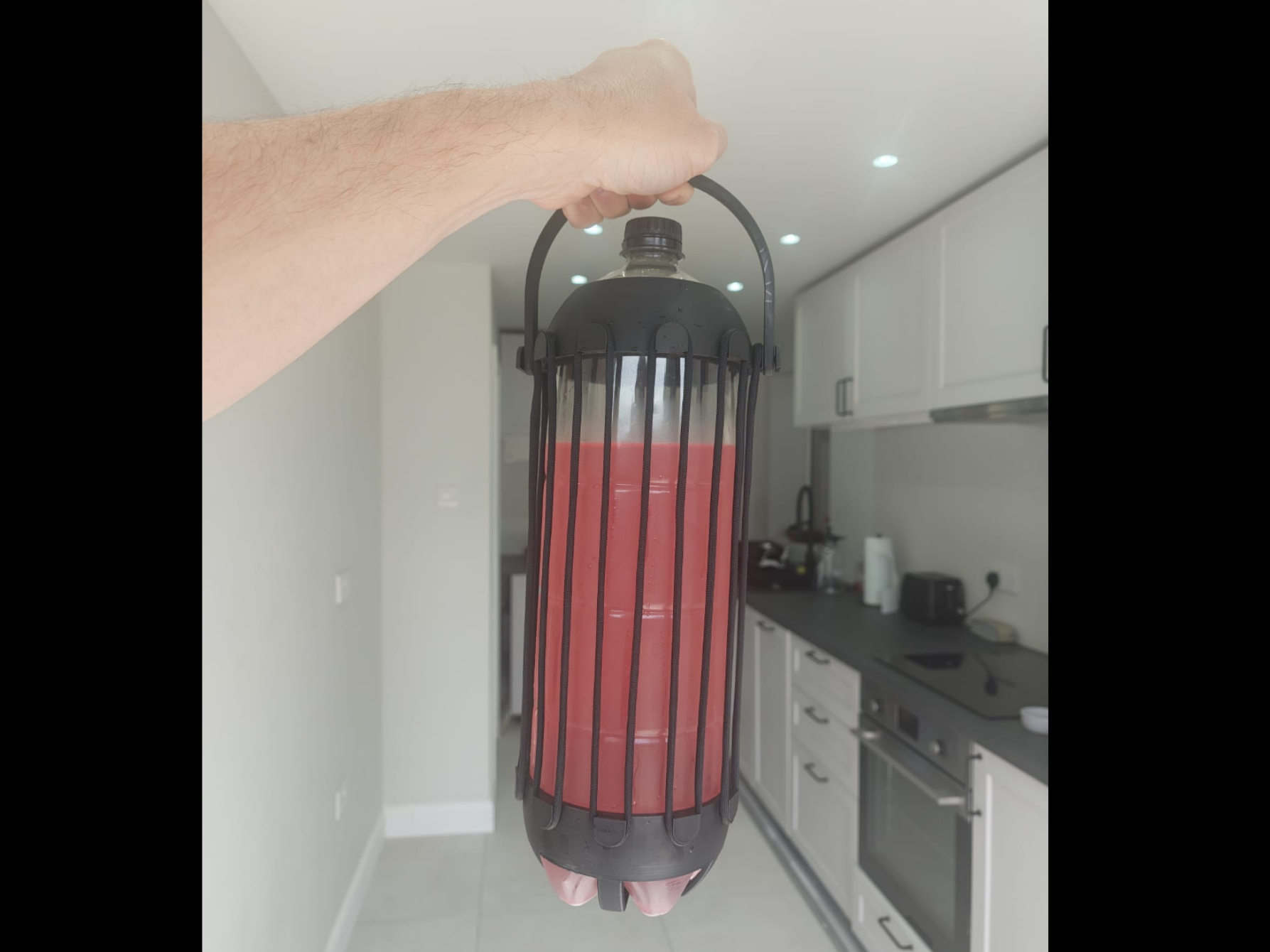 2L Bottle Carry Cradle