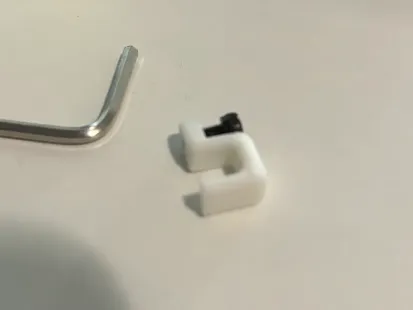 wire clip for wall/under table