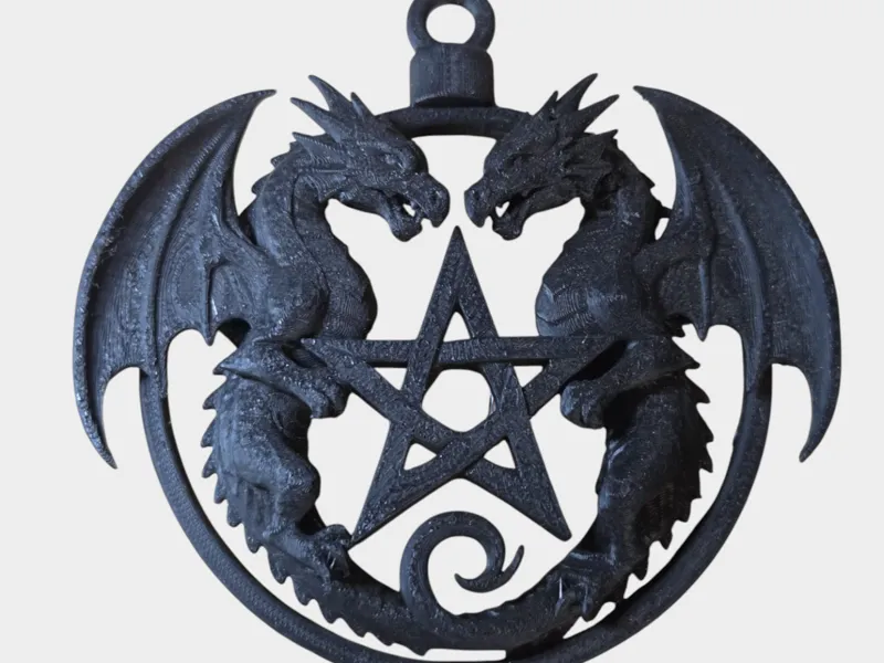 Dragon ornament with star / cross