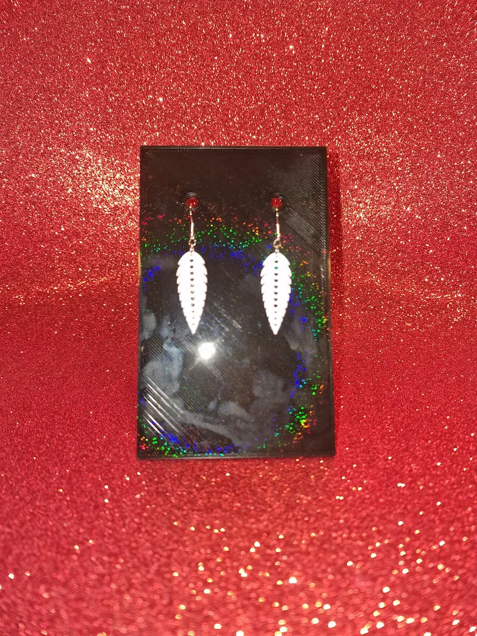 Feather of hearts earring view 2