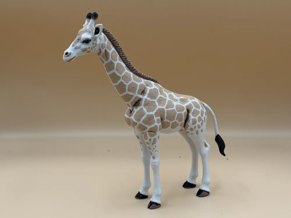 Letrero o emblema decorativo: High Plains Giraffe. Referencia del modelo original.