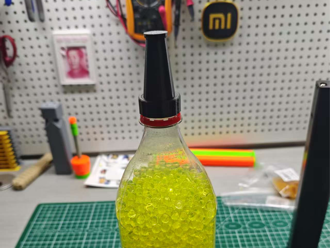 Miniatura 1 do modelo 3D 水弹可乐瓶加弹口(带盖)