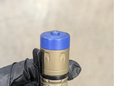 Olight Warrior Ultra end cover button