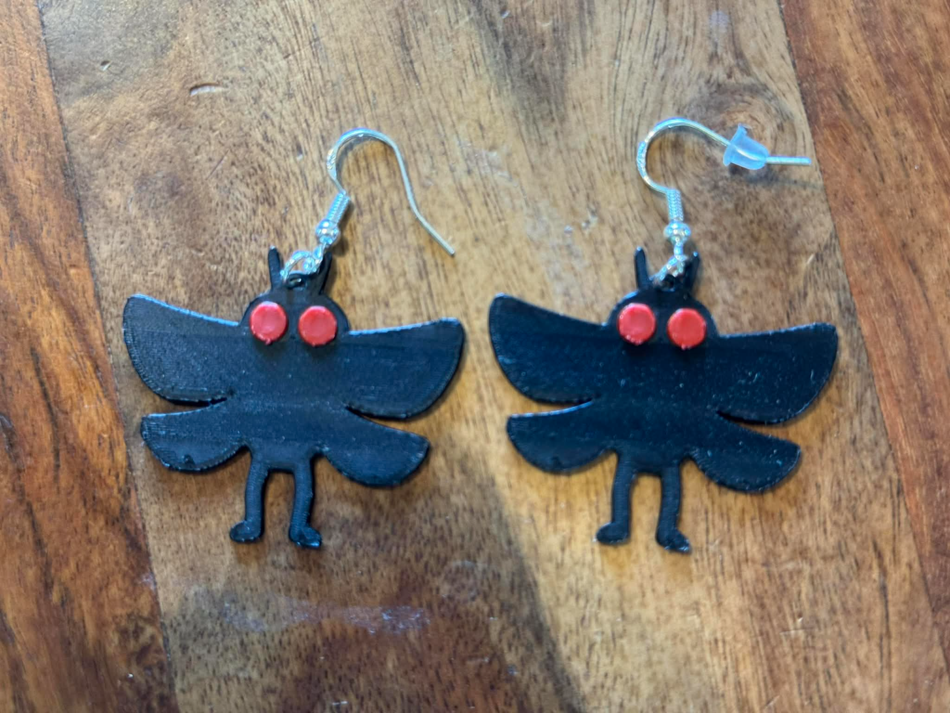 Mothman dangle earrings
