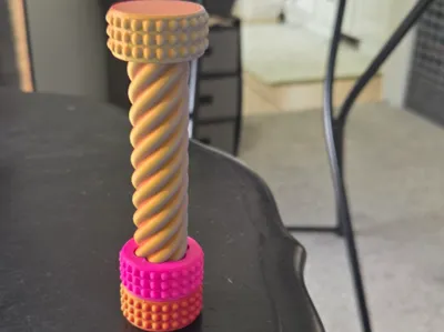 Twist Fidget w/2colors and heavy nut.