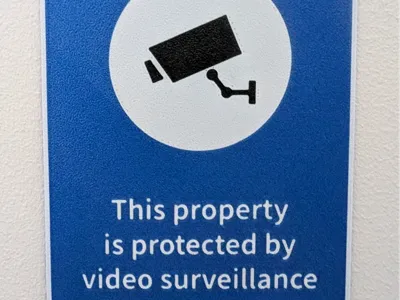 Surveillance video camera sign