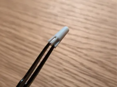 iFixit tweezer cap