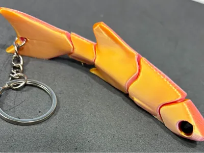 Articulated little fish keychain