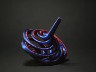 Helix petal spinning top