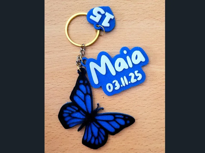 Llavero de mariposa + corazón 15 años