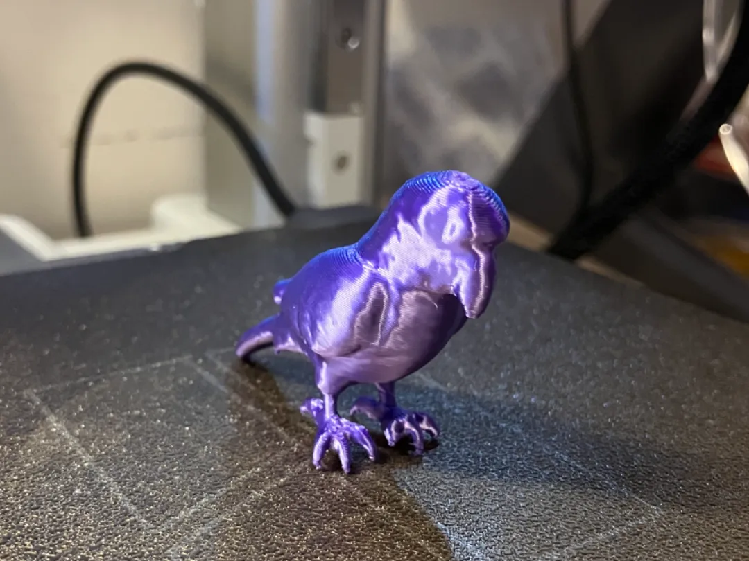 Figurine miniature perroquet