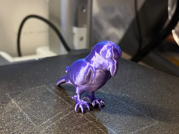 Figurine miniature perroquet