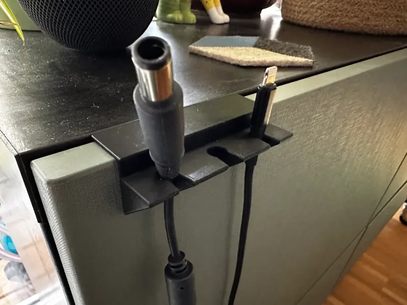 Hang-on cable holder for IKEA Besta doors