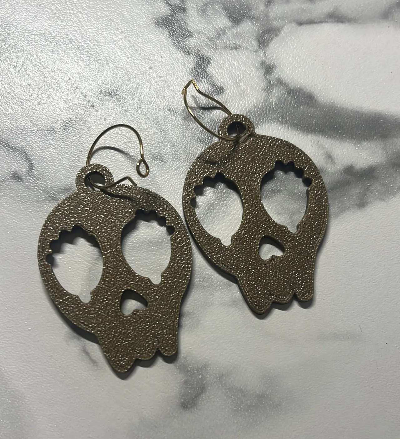 Skull earrings view 2