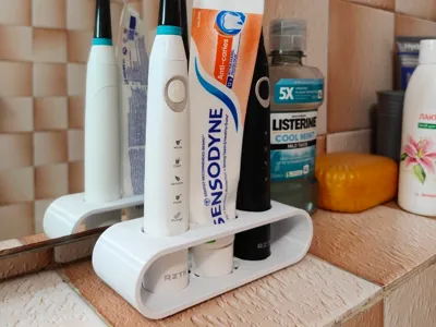 Toothbrush holder with drain holes
