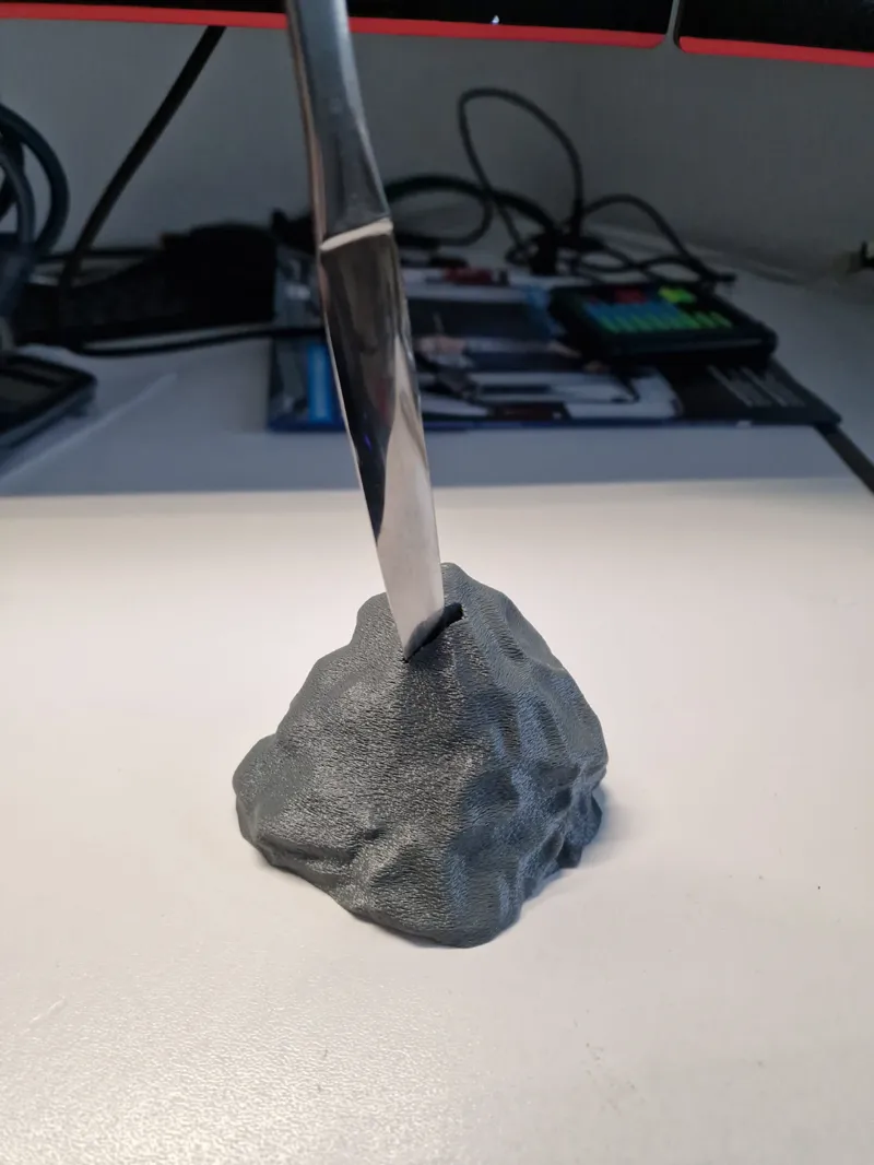 Rock letter opener stand
