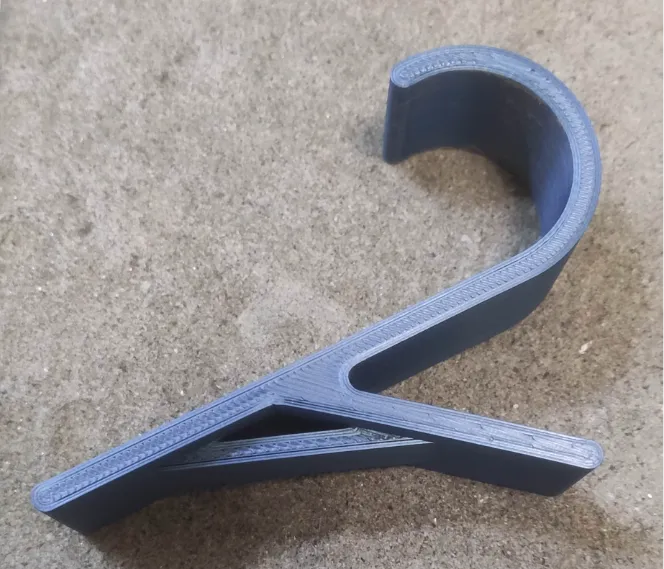 Reinforced radiator towel hook