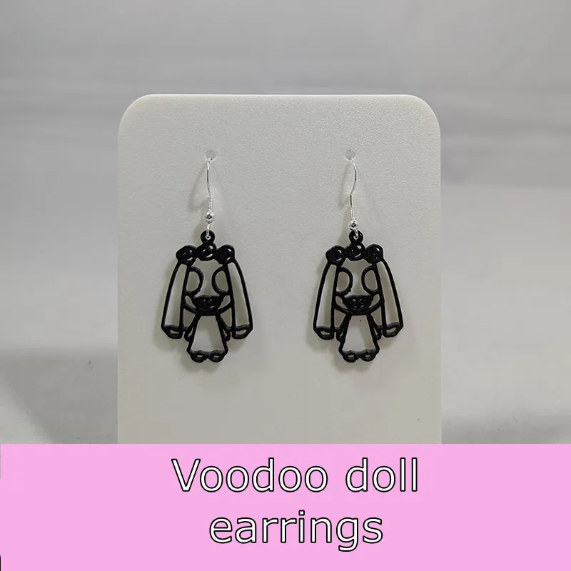 Voodoo doll earrings view 2