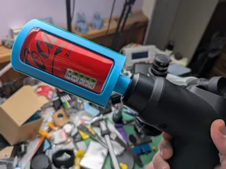 Soda can massage gun shaker