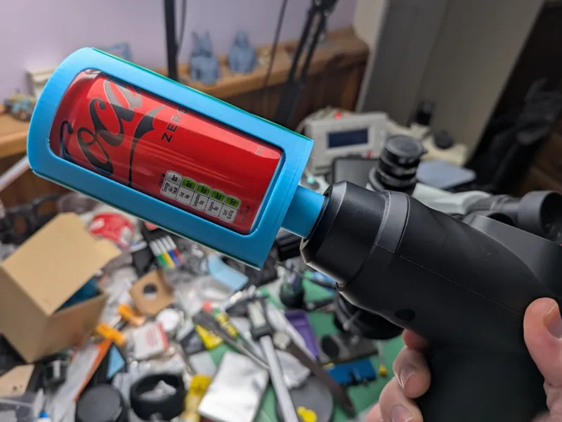 Soda can massage gun shaker