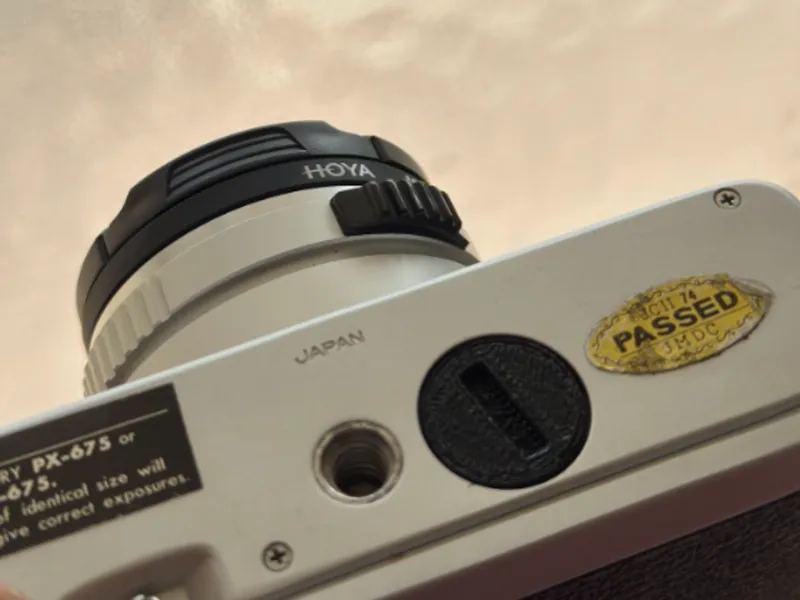 Konica C35 Series battery cap and opening tools