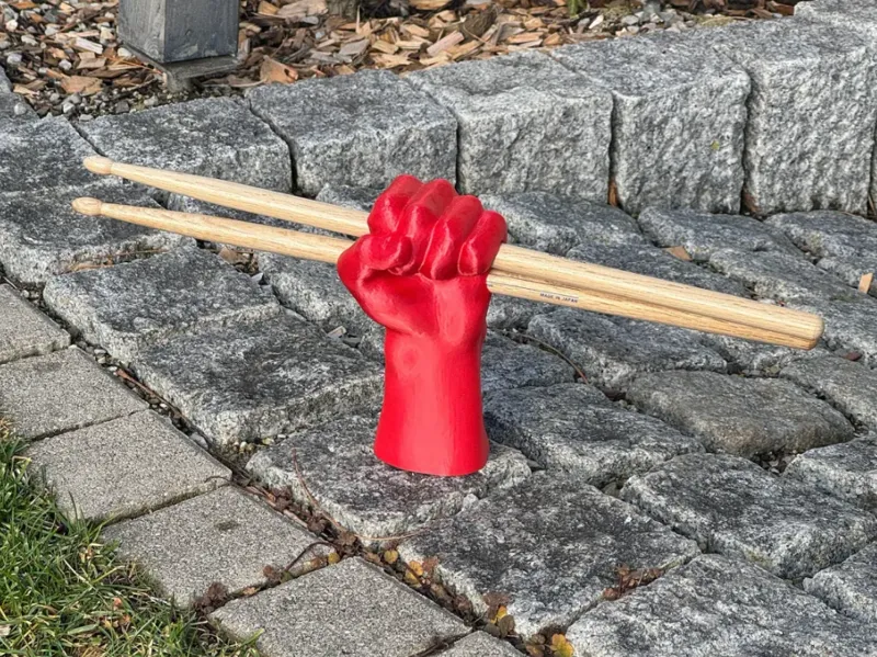 Hand drumstick holder