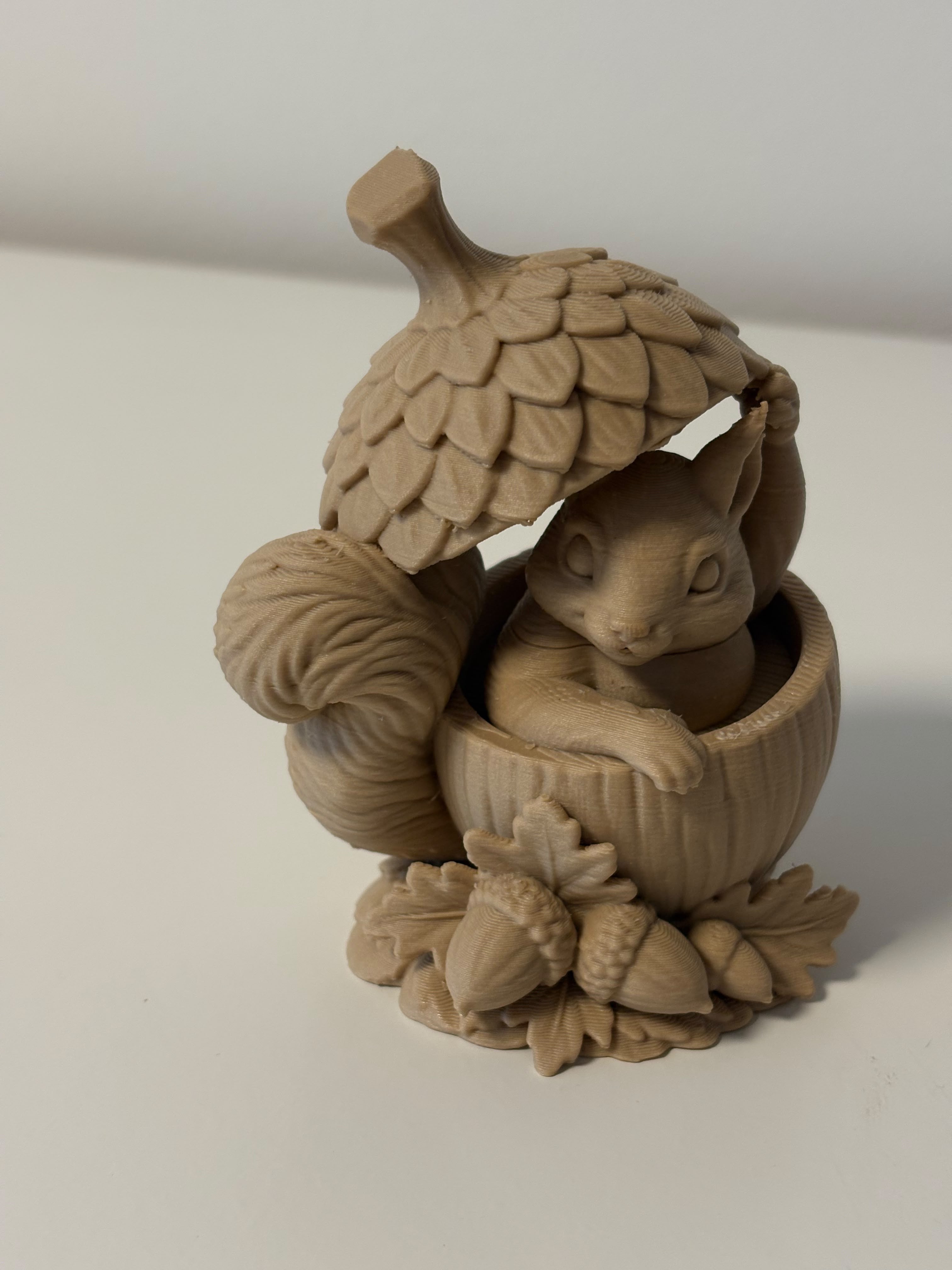 Cozy Squirrel in an Acorn – Woodland Sculpture - 1