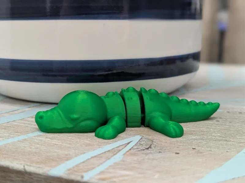 Cute articulated baby crocodile 