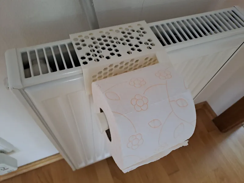 toilet paper holder for standard heater