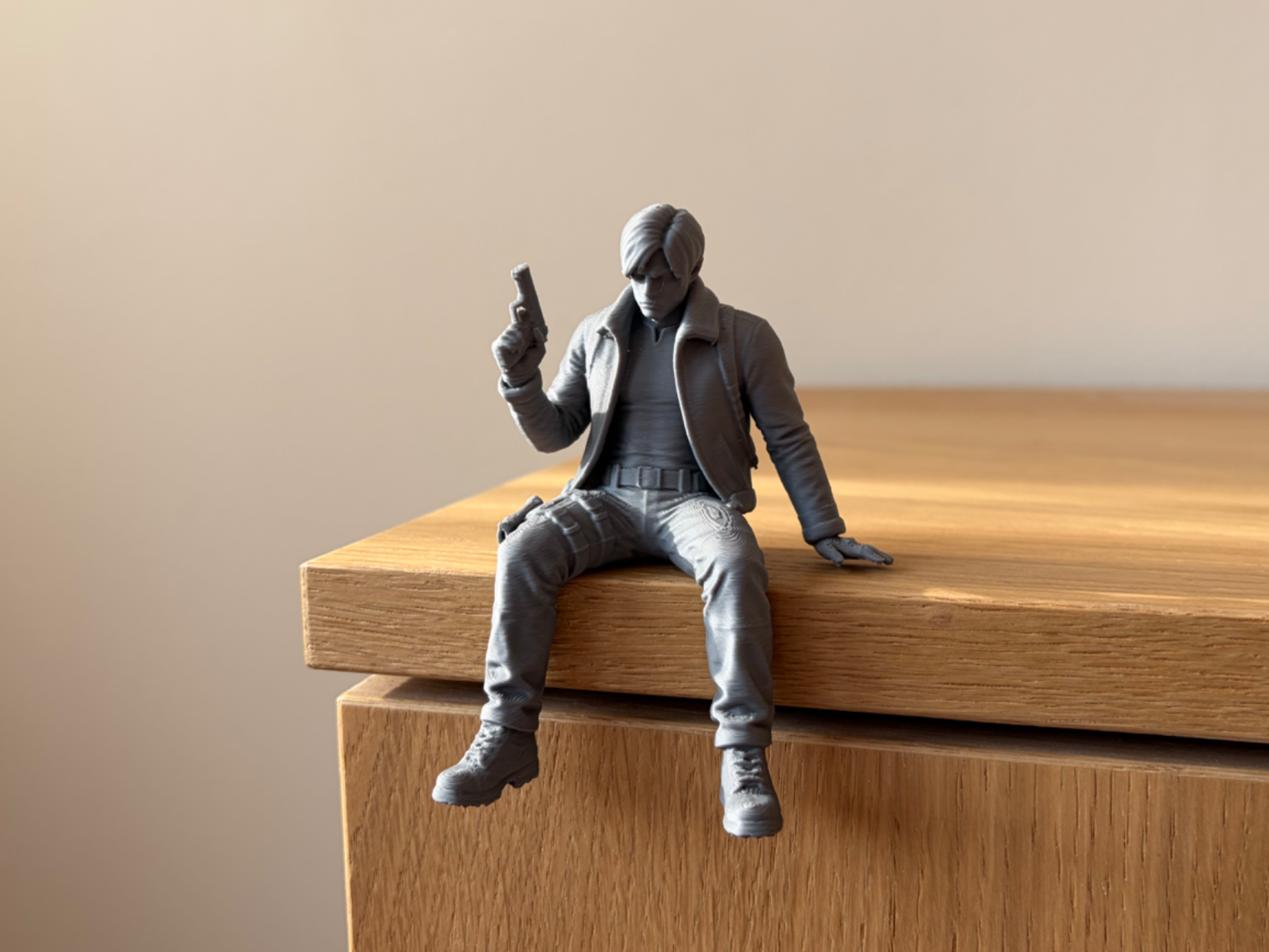Leon Sitting on Ledge Shelf Figure | Resident Evil