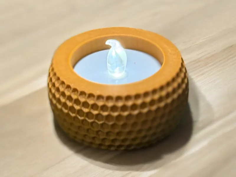 Tea light holders with textured surface