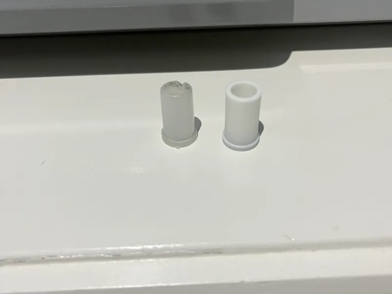 Toilet roll holder flap spacer