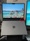 Raised back laptop for fingerprint scanner access