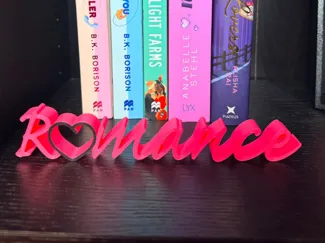 "Romance" Schriftzug mit Herz