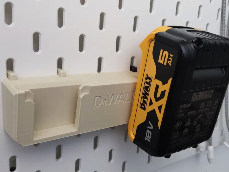Ikeas Skadis holder for Dewalt XR battery pack