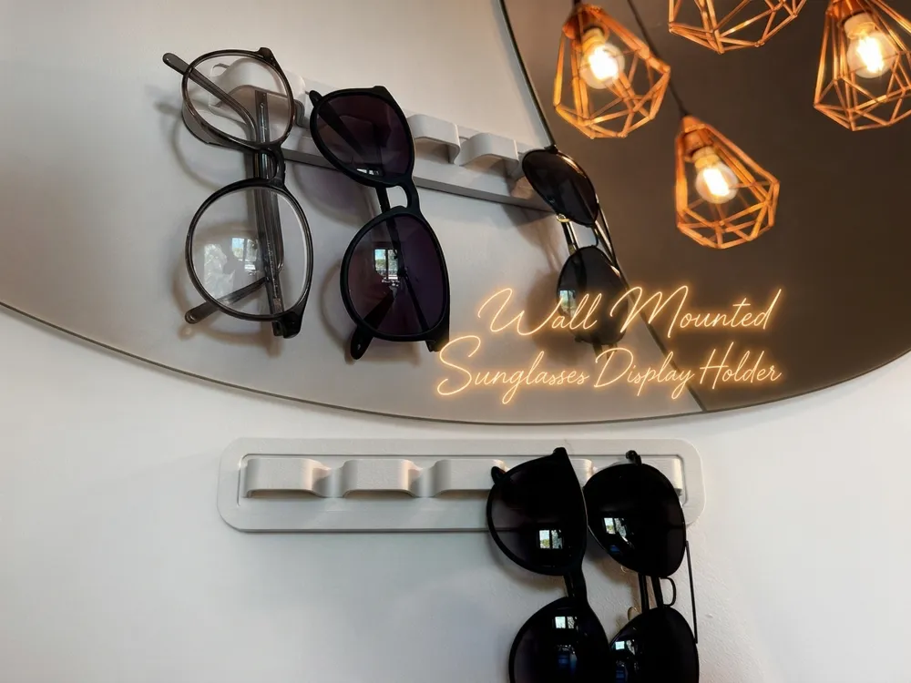 Soporte: wall mounted sunglasses display holder. Referencia del modelo original.