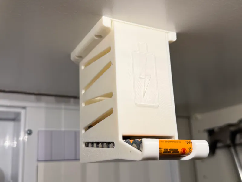 Mounted battery dispencer for AA and AAA